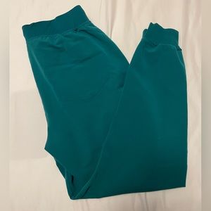 Mandala 9 pocket joggers. hunter green